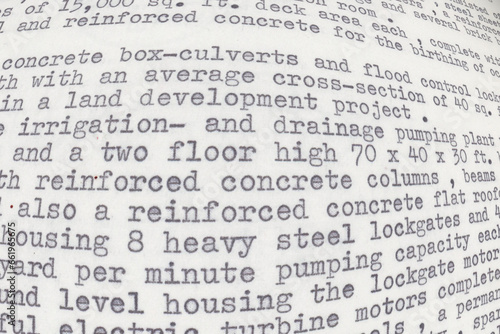 Distorted text written on an old typewriter. It is part of a resume of a civil engineer who has worked in the sixties in South America. Text background