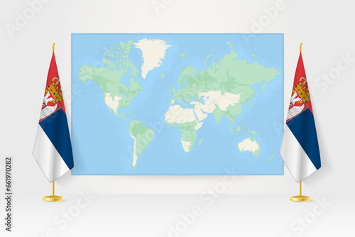 World Map between two hanging flags of Serbia flag stand.