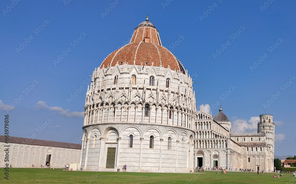 Fototapeta premium The Baptistery of Pisa Leaning Tower at the Piazza dei Miracoli or the Square of Miracles in Pisa, Italy