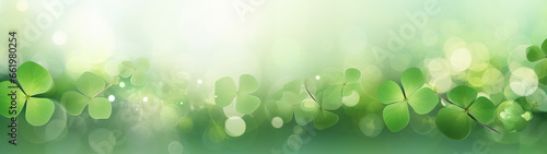 four leave clover as lucky charm on blurred light green background, sylvester banner