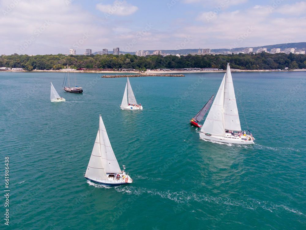 Aerial view of sailing yachts regatta race on sea
