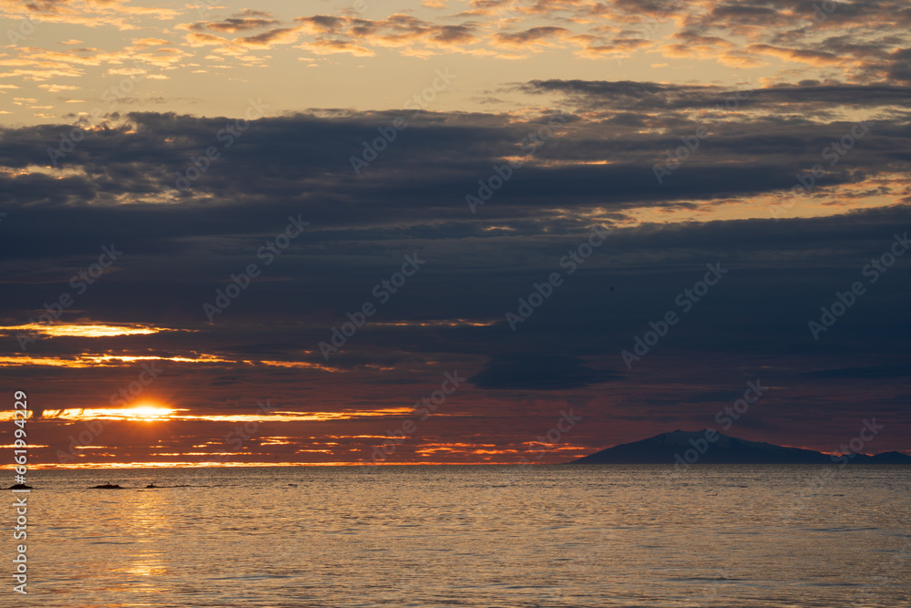 Sunset over Snæfellsjökull glacier and sea seen from Akranes in Iceland.