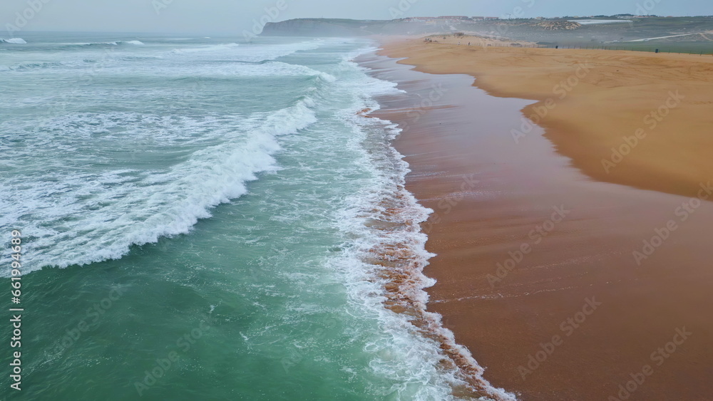 Gloomy marine surf nature slow motion. Serene sea coast with foaming grey waves