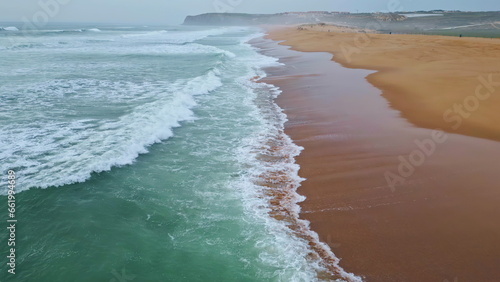 Gloomy marine surf nature slow motion. Serene sea coast with foaming grey waves
