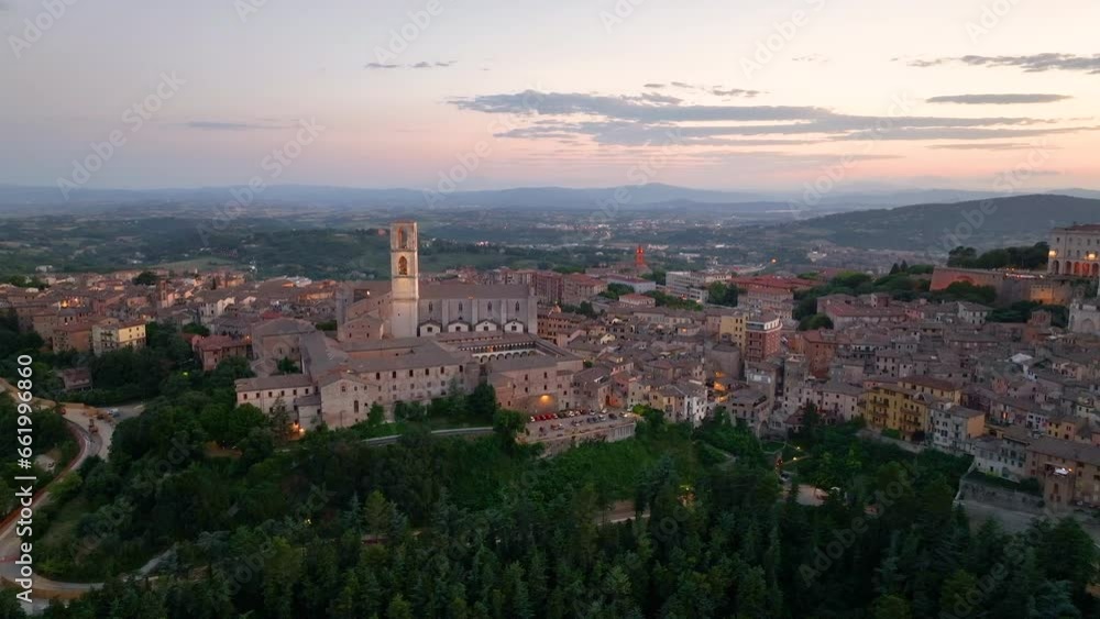 Aerial view of Perugia city skyline at night evening, Basilica di San Domenico, capital of Umbria, Italy Aerial view of Perugia city skyline at night evening, Basilica di San Domenico, capital of Umbria, Italy