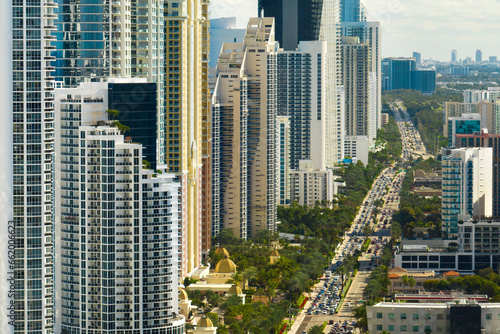 Wallpaper Mural Aerial view of Sunny Isles Beach city with congested street traffic and luxurious highrise hotels and condos on Atlantic ocean shore. American tourism infrastructure in southern Florida Torontodigital.ca