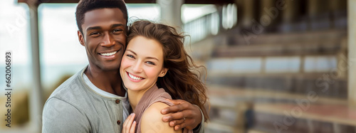 happy interracial couple in love on the street, smiling, family,