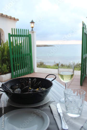 Romantic dinner for one person with mussels and white wine