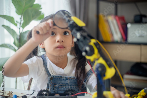 Wallpaper Mural STEM education concept. Asian young girl learning robot design. Torontodigital.ca