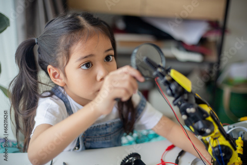 Wallpaper Mural STEM education concept. Asian young girl learning robot design. Torontodigital.ca