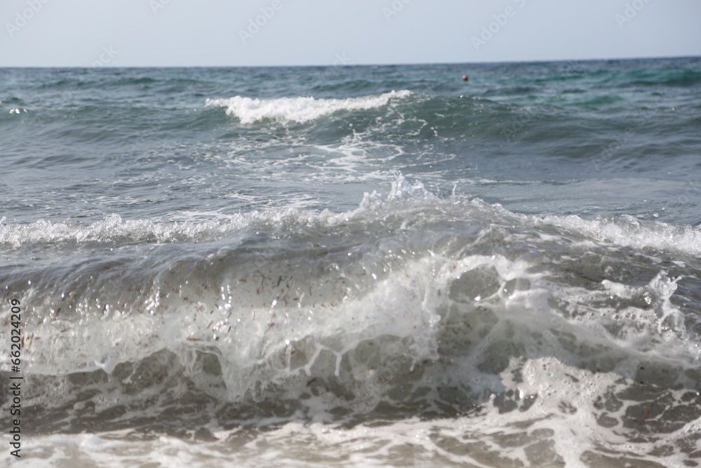 sea waves at beach nature background. sea waves at beach in summer. photo of sea waves sea waves at beach nature background. sea waves at beach in summer. photo of sea waves