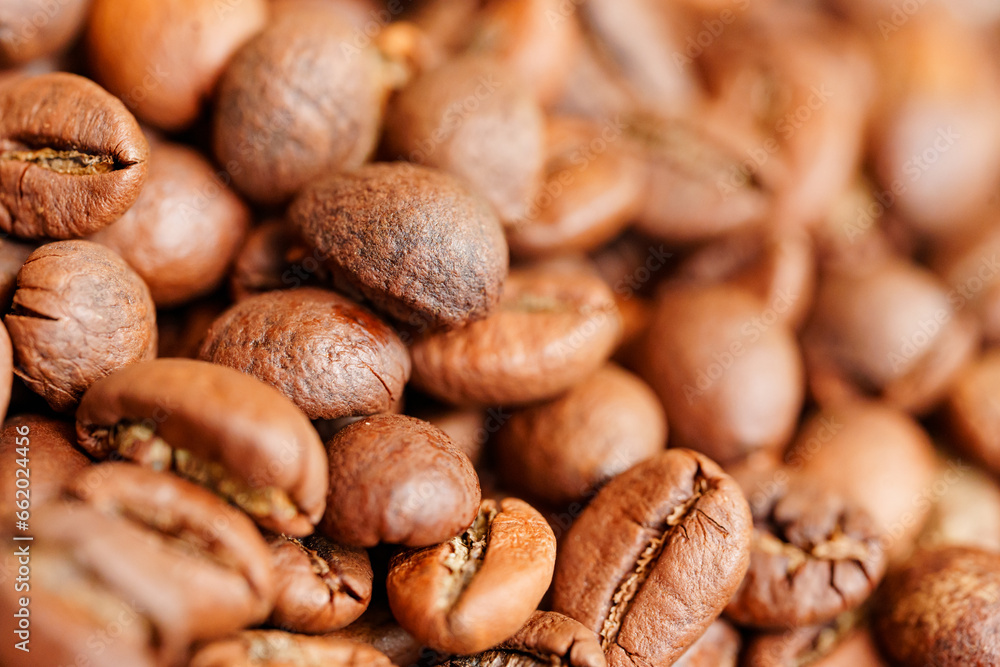 Naklejka premium Roasted coffee beans. background.
