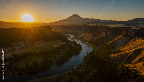 Drone style photo from Central Oregon, shot at sunset and focusing on the nature and riverscape.  © @foxfotoco