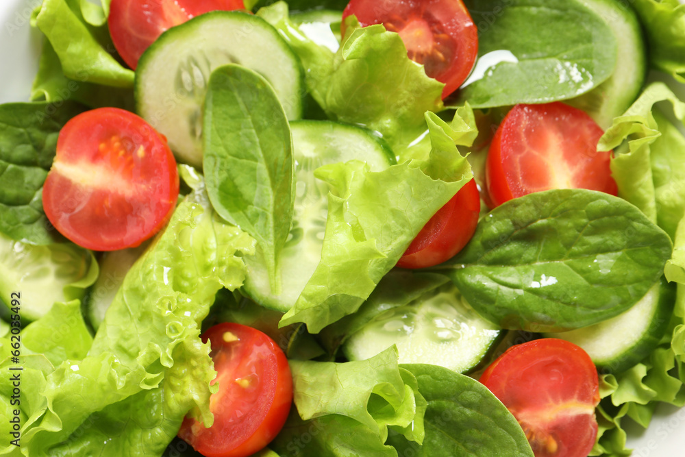 Delicious vegetable salad on white background, top view Delicious vegetable salad on white background, top view