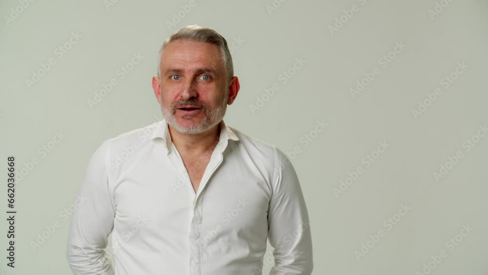 Surprised middle aged man dumbfounded by unexpected news. Confused businessman does not want to hear about project failure. Boss shocked by subordinate screw up. Emotions and feelings of Surprised middle aged man dumbfounded by unexpected news. Confused businessman does not want to hear about project failure. Boss shocked by subordinate screw up. Emotions and feelings of