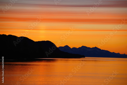 Photo Mountains and sea - sunset & alpineglow