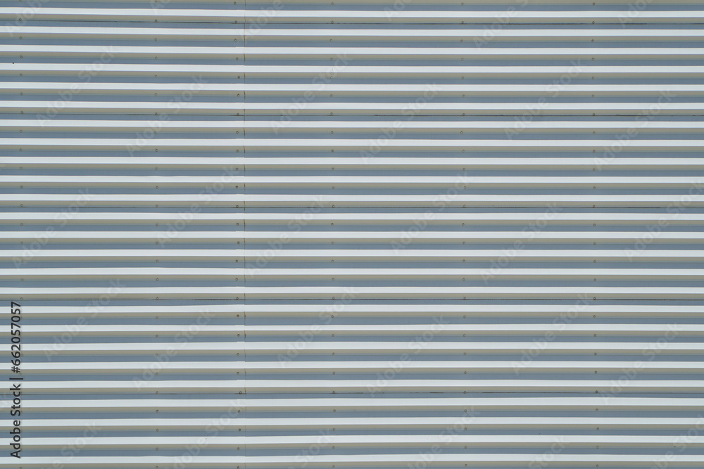 Wide white industrial metallic textured facade Wide white industrial metallic textured facade