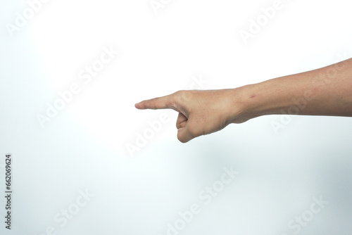 Man pointing at something on white background, closeup of hand © AriaSandi