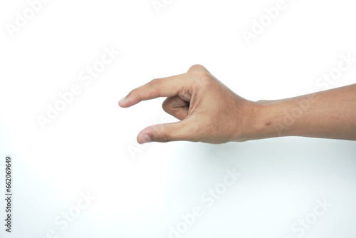 Hand making gesture while taking something isolated. hand showing or holding something closeup. hand measuring invisible items. 