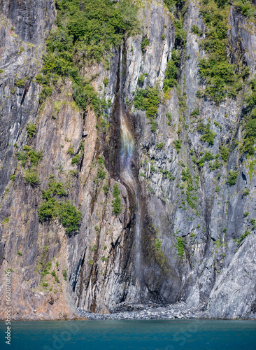 Rainbow in Alaskan Mountain Waterfall © Marta