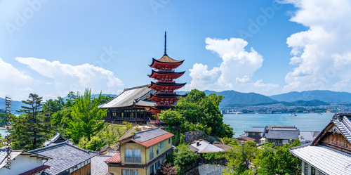 Miyajima island city view with Five-storied Pagoda in the precincts of itsukushima shrine at daytime.