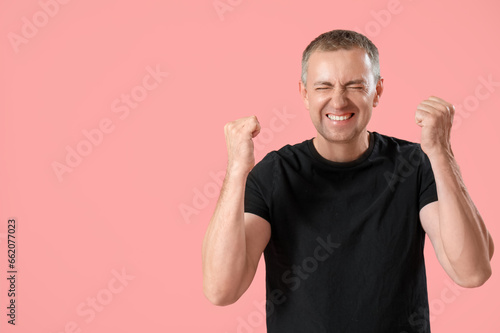 Portrait of happy mature ma...