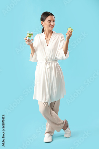 Young woman with glass of c...