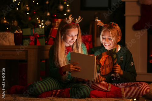 Little children reading sto...