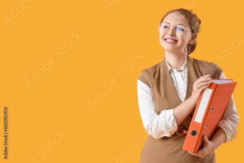 Young businesswoman with do...