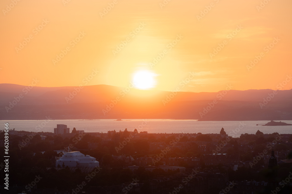 Warm Sunset over city. Golden hour.Landscape photography