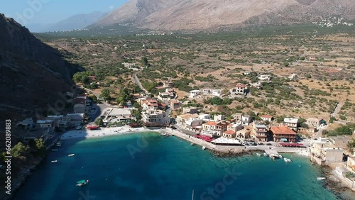 Aerial scenic view of the traditional fishing village Gerolimenas and the old port. Its one of the most picturesque settlements of Mani with crystal water and a small natural harbor in Laconia, Greece