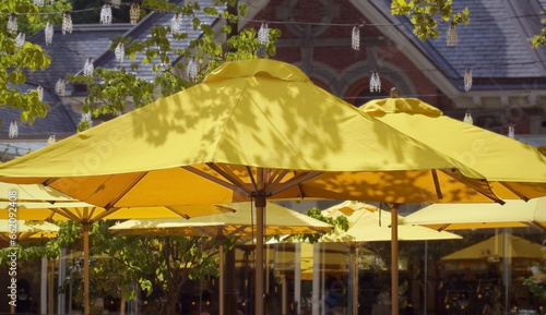 bright yellow umbrella pattern at an outdoor restaurant 