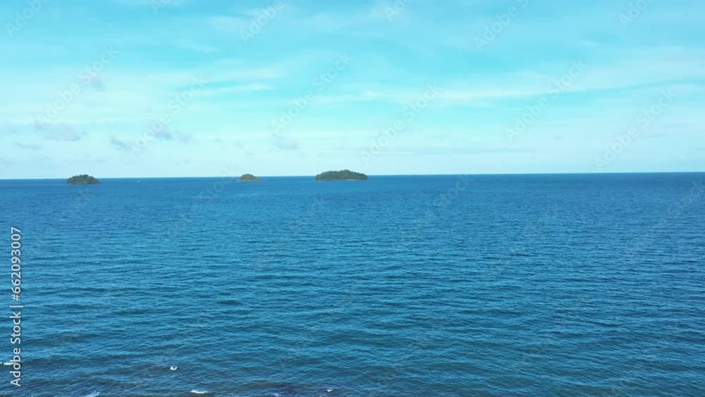Seascape with small island. Blue sea surface from above, sea from a drone. Beauty of nature concept backgroun. beautiful island Seascape with small island. Blue sea surface from above, sea from a drone. Beauty of nature concept backgroun. beautiful island