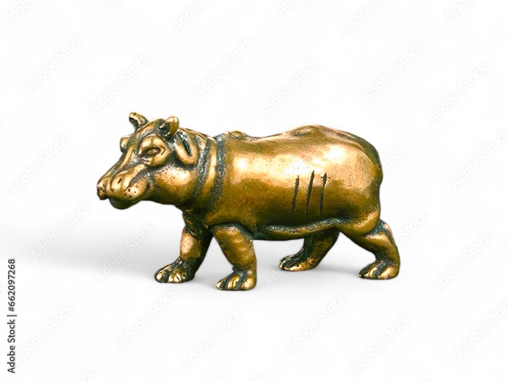 Miniature animal gold color hippo on white background

