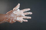 young man washing hands with soap warm water 