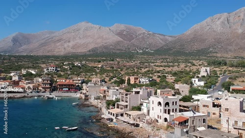 Aerial scenic view of the traditional fishing village Gerolimenas and the old port. Its one of the most picturesque settlements of Mani with crystal water and a small natural harbor in Laconia, Greece