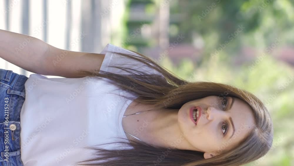 Vertical Video of Woman is having a nervous breakdown outside. Vertical Video of Woman is having a nervous breakdown outside.