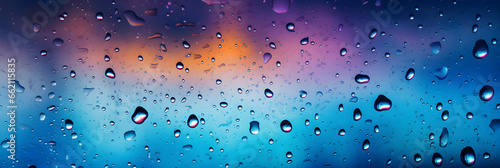 abstract colourful background with rain drops on window glass