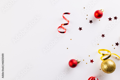 Christmas stars, baubles decorations with copy space on white background