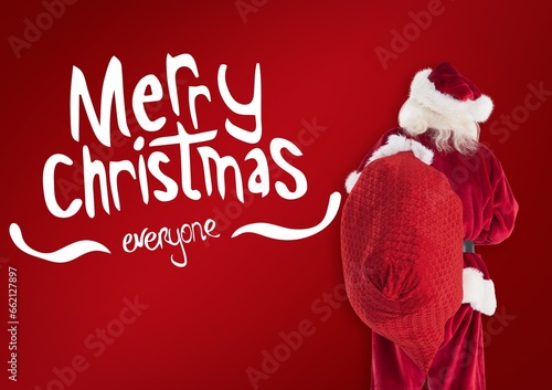 Composite of merry christmas everyone text and santa claus with red sack photo