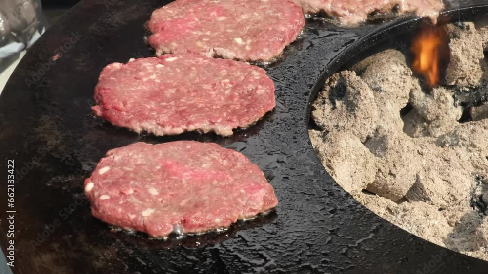 Meat hamburger cutlets close-up fried on an open grill. Meat hamburger cutlets close-up fried on an open grill.