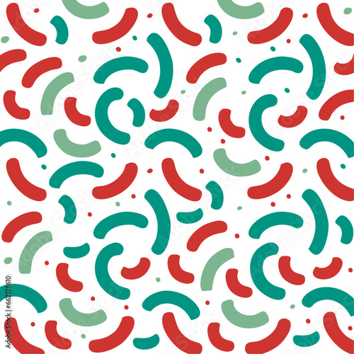 Red and Green Memphis Squiggle Christmas Seamless Pattern.A fun and festive seamless pattern with red and green Memphis squiggles on a white background. 