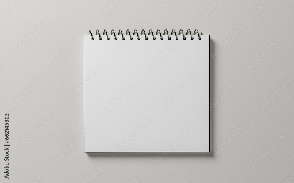 white blank notepad sheet mockup. spiral calendar on gray background. square shape notebook. top view. copy space white blank notepad sheet mockup. spiral calendar on gray background. square shape notebook. top view. copy space