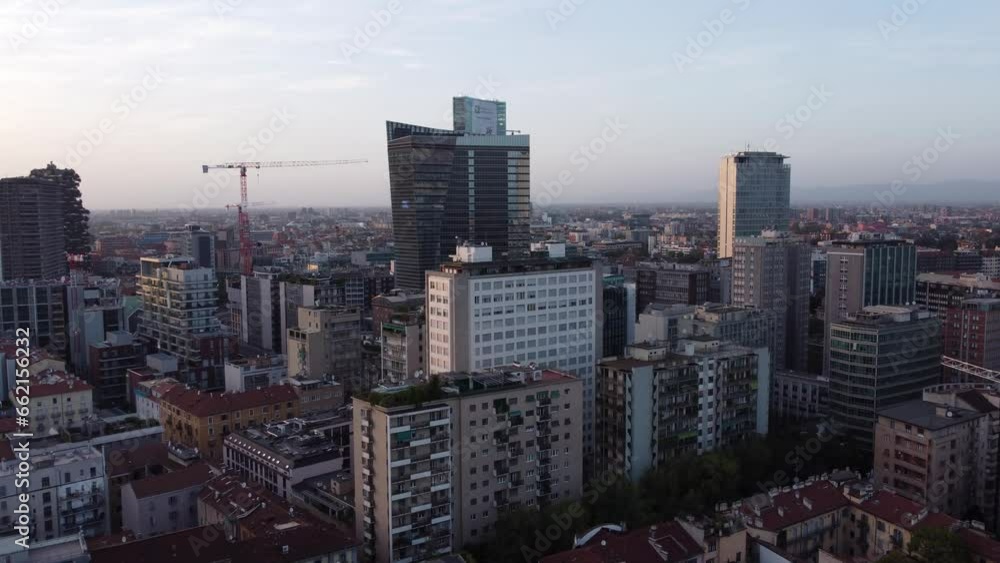 Flying over Milan at sunset in the Central Station area - Dji professionale 4k drone Flying over Milan at sunset in the Central Station area - Dji professionale 4k drone