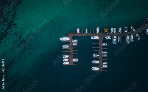 Aerial view of fishing boat docked at the pier in Lofoten, Norway  photo