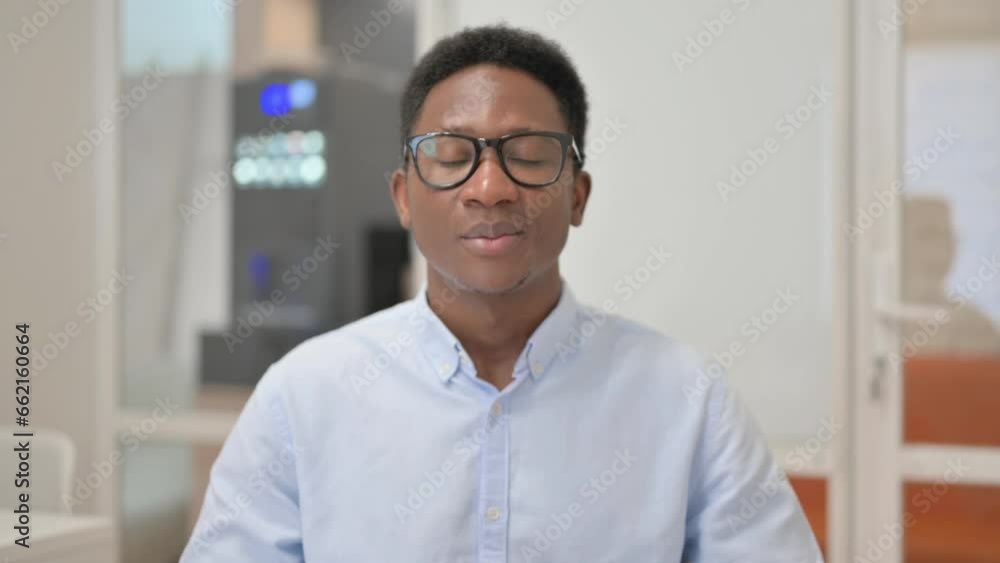 Blogging African Businessman Doing Video Chat in Office Blogging African Businessman Doing Video Chat in Office