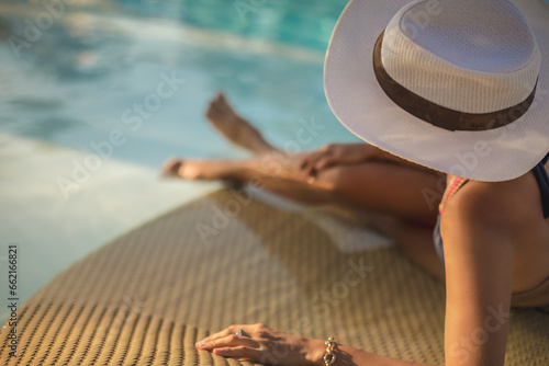 Woman Sunbathing on a Luxury Sunbed