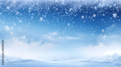 Une composition dans le ciel bleu avec des flocons de neige et des nuages en hiver. © Gautierbzh