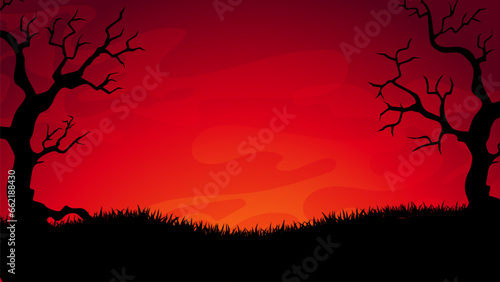 Gloomy ominous Halloween landscape. Crimson sunset.