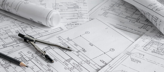 architect design working drawing sketch plans blueprints and making architectural construction model in architect studio,flat lay.